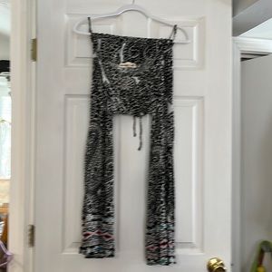 Black kind of hippie design jumpsuit spaghetti strap small